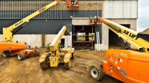 Construction site with JLG lifts and machinery at SilverFlame.